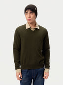 Model wearing the Unisex Seamless Cashmere Logo-Patch Beanie in Olive Brown, full-length front view