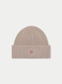Flat lay of the Unisex Seamless Cashmere Ribbed Beanie in Taupe.