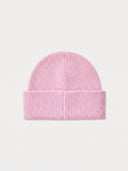 The Seamless Cashmere Ribbed Beanie in Light Pink, back view