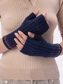 Model wearing the Cashmere Striped Fingerless Gloves in Navy, worn view