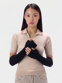 Model wearing the Cashmere Rib-Knit Fingerless Gloves in Black, front view