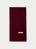The Cashmere Classic Knitted Scarf in Wine Red, flat lay front view