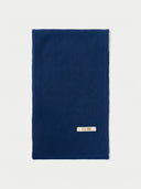 The Cashmere Fine-Knit Long Scarf in Deep Blue, flat lay front view