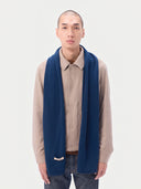 Model wearing the Cashmere Fine-Knit Long Scarf in Deep Blue, full-length front view
