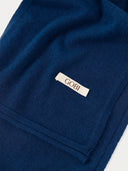The Cashmere Fine-Knit Long Scarf in Deep Blue, close-up of the cashmere knit