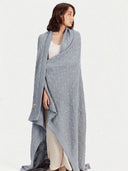 Model wearing the Cable Knit Cashmere Blanket in Light Gray, full-length front view