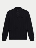 A black long-sleeve cable-knit polo sweater with a buttoned mock neck collar and a small embroidered logo on the chest, displayed on a light gray background.