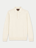 An off-white long-sleeve knit polo sweater with a small embroidered logo on the left chest, displayed flat against a light gray background.