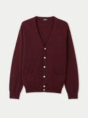 flat lay of a maroon v-neck cardigan with buttons, side pockets on a light gray background #color_ zinfandel