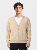 Model wearing the Timeless Cashmere V-Neck Cardigan in Beige, close front view