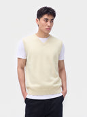 Model wearing the Essential Cashmere V-Neck Vest in White, front view