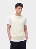 Model wearing the Essential Cashmere V-Neck Vest in Off-White, front view