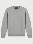 A light gray heather crewneck sweater with long sleeves and ribbed cuffs and hem, shown flat against a light gray background. A brown neck label with the brand name 'GOBI' is visible.