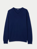 Navy blue sweater on a light gray background. #color_navy-blue