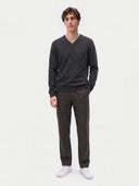 Model wearing the Cashmere V-Neck Sweater in Charcoal, full-length front view