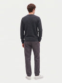 Model wearing the Cashmere V-Neck Sweater in Charcoal, back view