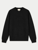 A black crewneck sweater with a tonal, tonal-embossed geometric pattern on the chest, displayed flat against a light gray background. The brand name 'GOBI' is visible on the inner neck label.