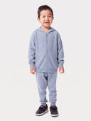 Child wearing the Unisex Seamless Zipper Hoodie in Light Gray, front view