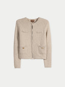 Beige textured cardigan on a light gray background #color_warm-grey