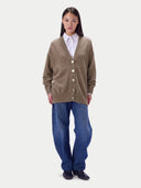 Model wearing the Cashmere Loose-Fit V-Neck Cardigan in Taupe, full-length front view