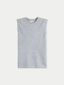 Sleeveless top with a subtle pattern on a white background #color_high-rise