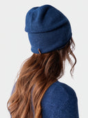 Model wearing the Cashmere Fine-Knit Crewneck Sweater in Deep Blue, back view