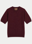 A burgundy ribbed knit short-sleeve sweater with a crew neck, displayed flat against a light gray background. A brown brand label reading 'GOBI' is visible inside the collar.