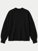 A black long-sleeve knit sweater with textured cable detailing down the sleeves, displayed flat against a light gray background.
