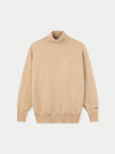 Beige turtleneck sweater on a light gray background #color_beige