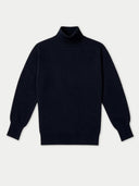 A dark navy blue knit turtleneck sweater with long sleeves, shown flat against a light gray background.