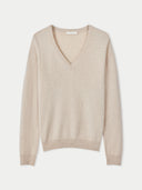 flat lay of a beige v-neck sweater #color_beige