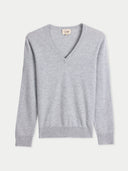 Gray v neck sweater with a brand logo on a light gray background #color_high-rise