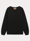 A black long-sleeve V-neck knit sweater with a brown brand label on the inner collar, displayed flat against a light gray background.