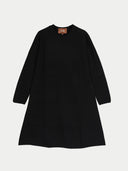 A black long-sleeve A-line dress with a crew neck, shown flat against a light gray background. A small brown brand label reading 'GOBI' is visible at the inner neckline.