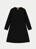 A black long-sleeve crewneck dress with an A-line silhouette, shown flat against a light gray background. A small brown brand label reading 'GOBI' is visible inside the collar.