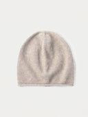 The Women's Lightweight Seamless Cashmere Beanie in Natural Beige, flat lay front view