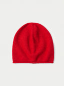 The Women's Lightweight Seamless Cashmere Beanie in Bright Red, flat lay front view