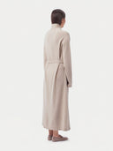 Model wearing the Cashmere Belted Robe Cardigan in Natural Beige, back view