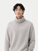 Man wearing a light gray turtleneck sweater on a white background  #color_dawn-blue