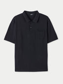 A men's black cotton silk cashmere blend polo shirt with a collar, short sleeves, and a chest pocket. #color_black