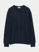 Navy sweater with a brand label on a light gray background #color_charcoal