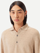 Men's Beige Cashmere Polo Sweater worn by model, detail view on white background