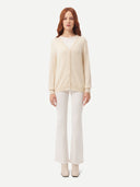 front view of a white V-neck cardigan and pants #color_off-white