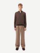 front view of a brown half-zip sweater and pants #color_cocoa