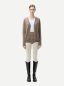 front view of a woman wearing brown cashmere  cardigan and underwear with white tights  #color_taupe