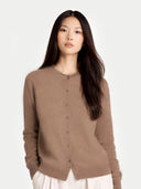 close up front view of a woman wearing a taupe colored crew neck cardigan #color_taupe
