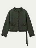 A dark olive green cropped knit jacket with braided trim details, featuring two front pockets and a drawstring tie at the waist, displayed on a solid white background.