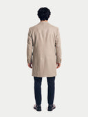Model wearing the Natural Color Single-Breasted Cashmere Coat in Taupe, back view