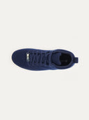 A top-down view of a navy sneaker with a textured knit upper and matching navy laces. The interior features a tan insole with the "GOBI" logo and "CASHMERE" printed in, all set against a white background. #color_navy