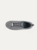 A top-down view of a gray sneaker with a textured knit upper and matching gray laces. The interior features a tan insole with the "GOBI" logo and "CASHMERE" printed in dark text, all set against a white background. #color_stone-gray